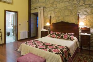Postel nebo postele na pokoji v ubytování Hotel Pazo O Rial