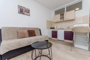 Kuchyňa alebo kuchynka v ubytovaní Apartments Tabak