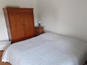 Postel nebo postele na pokoji v ubytování Cap dodo