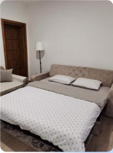 A bed or beds in a room at Markov Konak