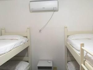 Cama ou camas em um quarto em Condo-Resort Juquehy, 4 quartos