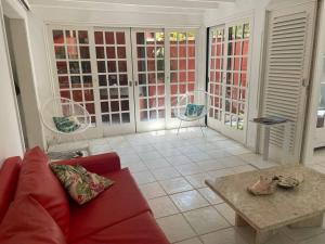 Uma área de estar em Condo-Resort Juquehy, 4 quartos