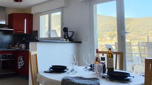 Kuchyňa alebo kuchynka v ubytovaní Appartement avec une belle vue sur Palalda