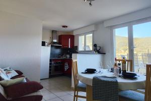 Kuchyňa alebo kuchynka v ubytovaní Appartement avec une belle vue sur Palalda
