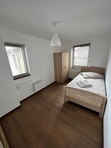 Postel nebo postele na pokoji v ubytování Gästehaus EMELI