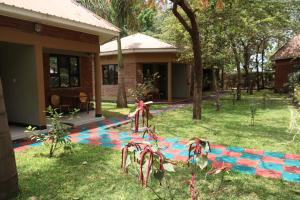 a house with a rangoli in the yard at POAPARK RESORT 