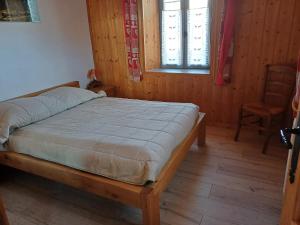 Łóżko lub łóżka w pokoju w obiekcie chalet Mont-Blanc