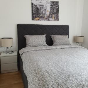 Postel nebo postele na pokoji v ubytování JR Lux apartman