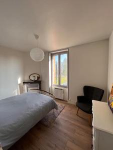 Katil atau katil-katil dalam bilik di L’appartement du Cher