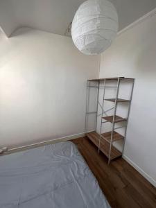 Katil atau katil-katil dalam bilik di L’appartement du Cher