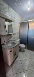Ένα μπάνιο στο Casa Praia Itapema - 2 andares 3 quartos +21 φωτογραφίες
