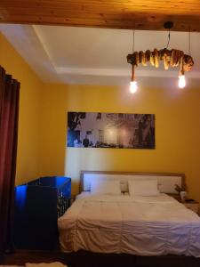 Katil atau katil-katil dalam bilik di Villa Elear