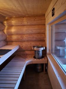 Postel nebo postele na pokoji v ubytování Böhmerwald Lodges
