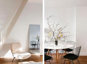 Un comedor con mesa y sillas en The Collector's House, en Amberes
