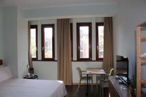 Postel nebo postele na pokoji v ubytování Bari Center Rooms