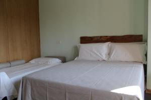 Postel nebo postele na pokoji v ubytování Bari Center Rooms