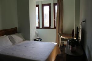 Postel nebo postele na pokoji v ubytování Bari Center Rooms