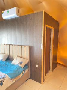 Säng eller sängar i ett rum på Wejdan Rum Luxury Camp