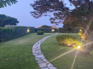 Сад в Pelosa - Capo Falcone Excellent Apartment