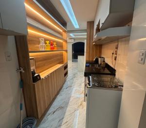 Η κουζίνα ή μικρή κουζίνα στο Incrível apartamento 3 suítes. +17 φωτογραφίες