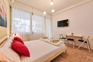 Ένα ή περισσότερα κρεβάτια σε δωμάτιο στο Apartment Lauben Bolzano