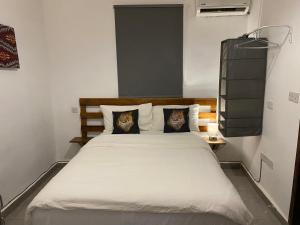מיטה או מיטות בחדר ב-Belvoir Apart-Hotel & Residence