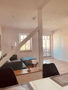 Postel nebo postele na pokoji v ubytování Lichtdurchflutetes Apartment mit Balkon