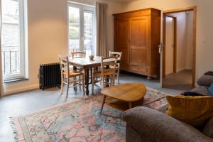 Ein Sitzbereich in der Unterkunft Li Ter Hôtel