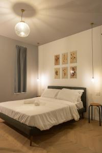 Ένα ή περισσότερα κρεβάτια σε δωμάτιο στο Sophia Boutique Suites