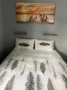 En eller flere senge i et værelse på beau-séjour