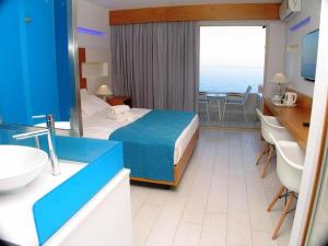 Postel nebo postele na pokoji v ubytování Europa Resort Hotel