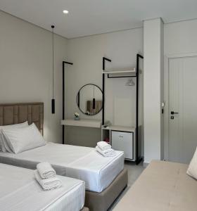 Postel nebo postele na pokoji v ubytování Astoria Rooms