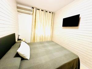 TV a/nebo společenská místnost v ubytování Hostal La Taberna