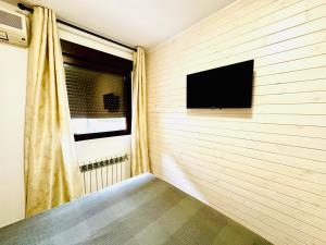 TV a/nebo společenská místnost v ubytování Hostal La Taberna