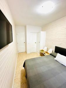 Postel nebo postele na pokoji v ubytování Hostal La Taberna