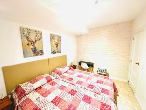 Postel nebo postele na pokoji v ubytování Hostal La Taberna