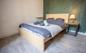 Llit o llits en una habitació de Appartement cosy au cœur de Toulon