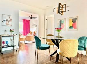 a dining room with a table and chairs at Spotless Modern Home Close to LAX & Sofi Stadium in Inglewood