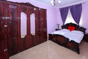 Llit o llits en una habitació de Rio's Apartment