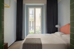 Armesto Rooms客房内的一张或多张床位