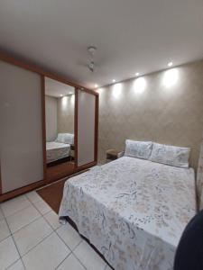 Легло или легла в стая в Apartamento Aconchegante em Serra condomínio com piscina 2QTS