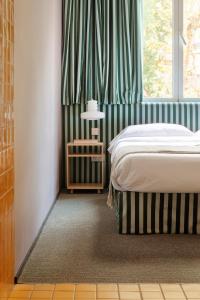 Armesto Rooms客房内的一张或多张床位