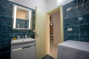 Koupelna v ubytování Appartamento Hakuna Matata + 41 fotografií