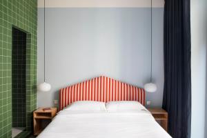 Armesto Rooms客房内的一张或多张床位