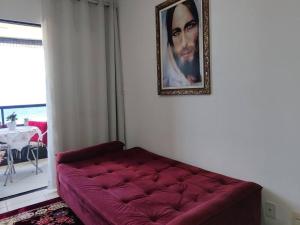 Tempat tidur dalam kamar di Conforto e Lazer