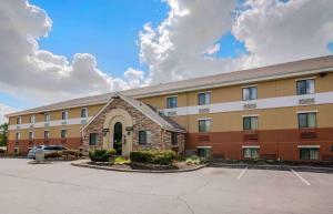 a building with a parking lot in front of it at Extended Stay America Suites - Dayton - South in Dayton