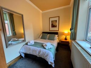 Postel nebo postele na pokoji v ubytování Beach View Apartment - Seafront Luxury Property, Bridlington