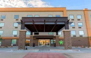 an office building with awning in front of it at Extended Stay America Premier Suites - Phoenix - Chandler - Downtown in Chandler
