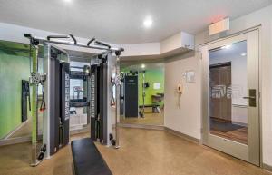 a room with a gym with a treadmill at Extended Stay America Select Suites - Tampa - Brandon - East in Tampa