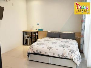Letto o letti in una camera di 充電樁 羅東雲朵朵Cloud B&B免費洗衣機 烘衣機 近週三清溝 星巴克咖啡豆 國旅卡特約店